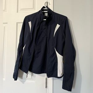 NIKE jacket. Worn a hand full of times. Super light and fits to your body nice!
